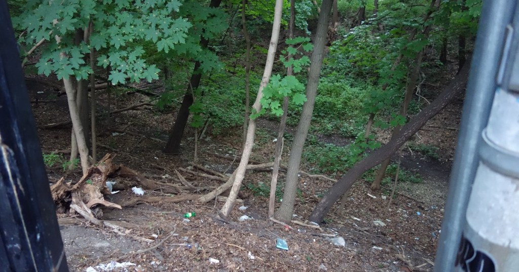 The former Rockaway Beach Branch right-of-way seen from Myrtle Avenue in Forest Park, Queens, in 2019